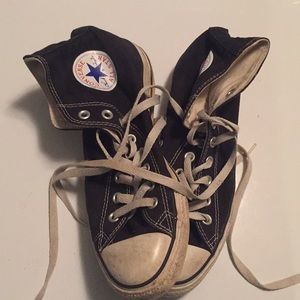 Woman’s size 7 high top converse